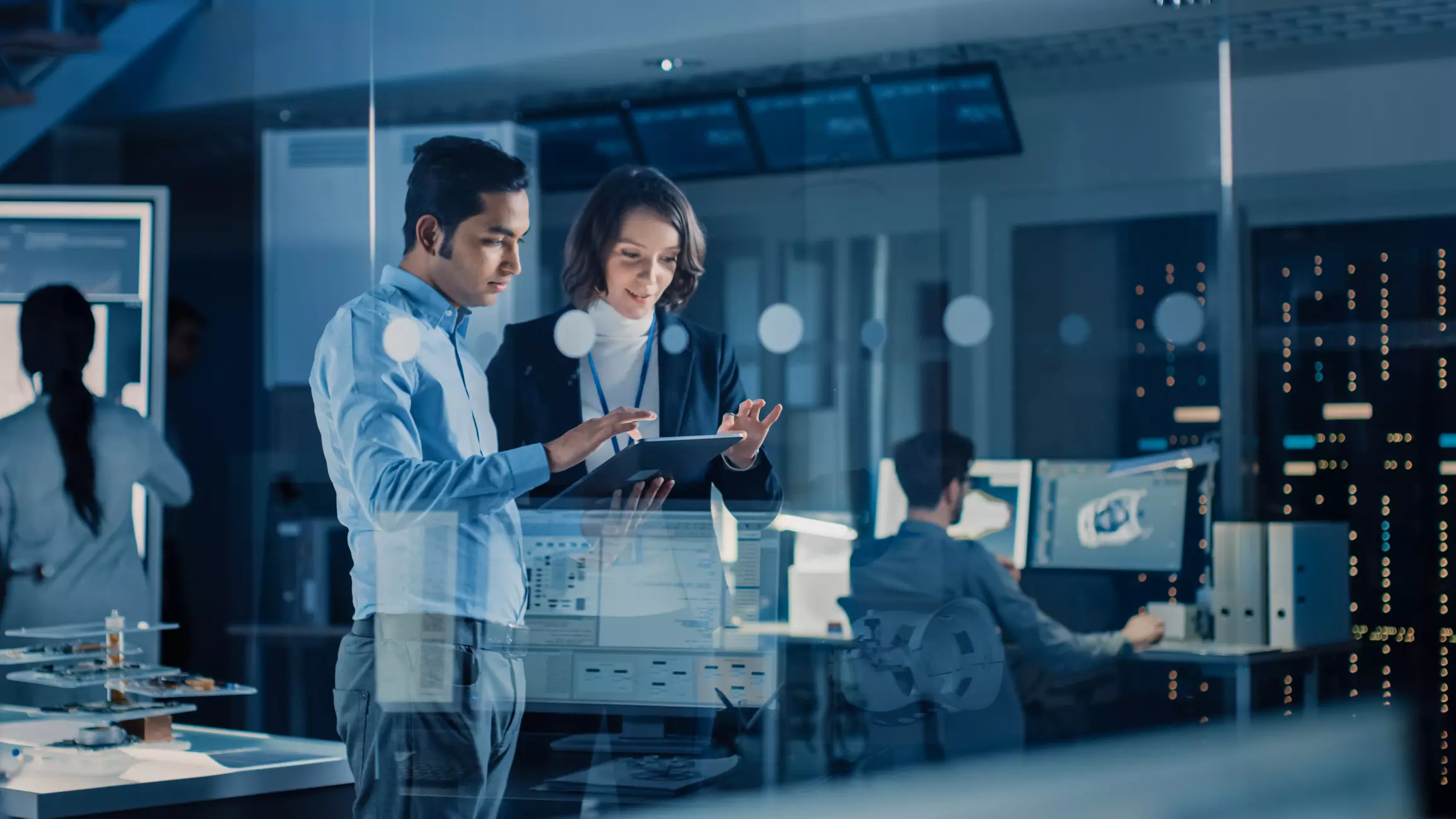 Two people in an modern office